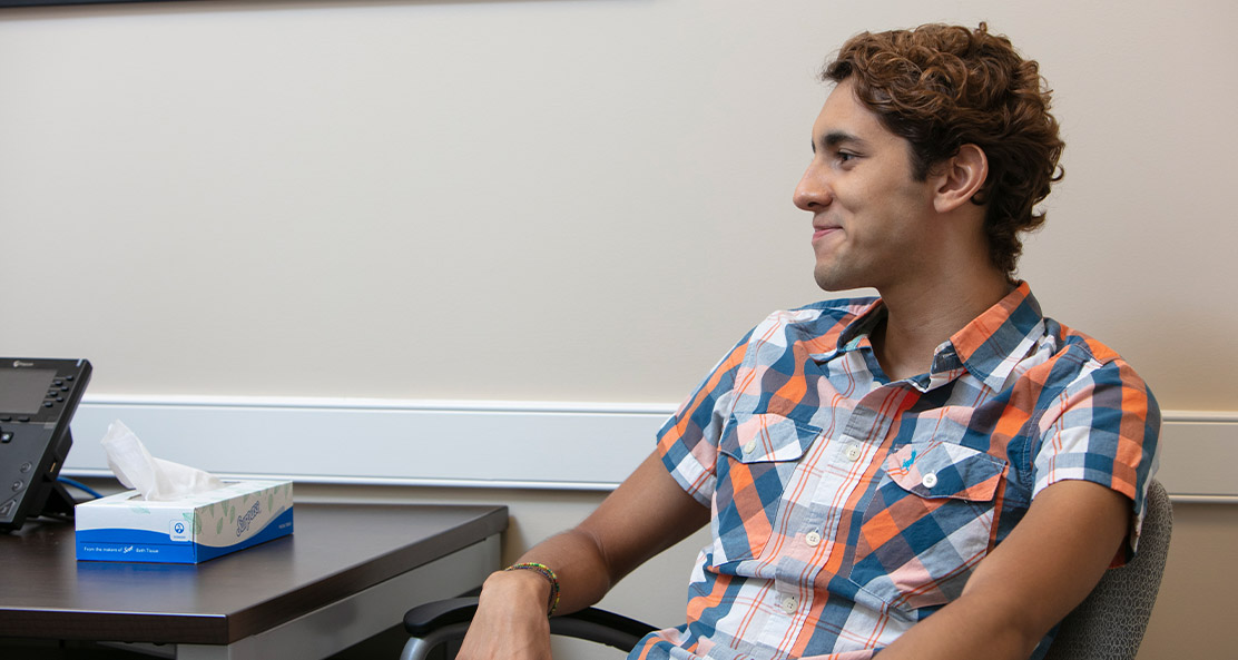 a man patient sitting in therapy